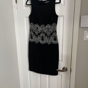 A bodycon dress ; black
